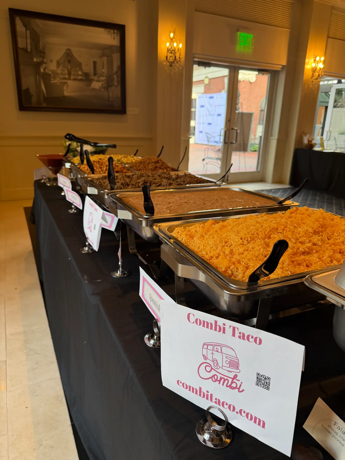 Chafing dish taco bar with Spanish rice, beans and meats at a Denver venue