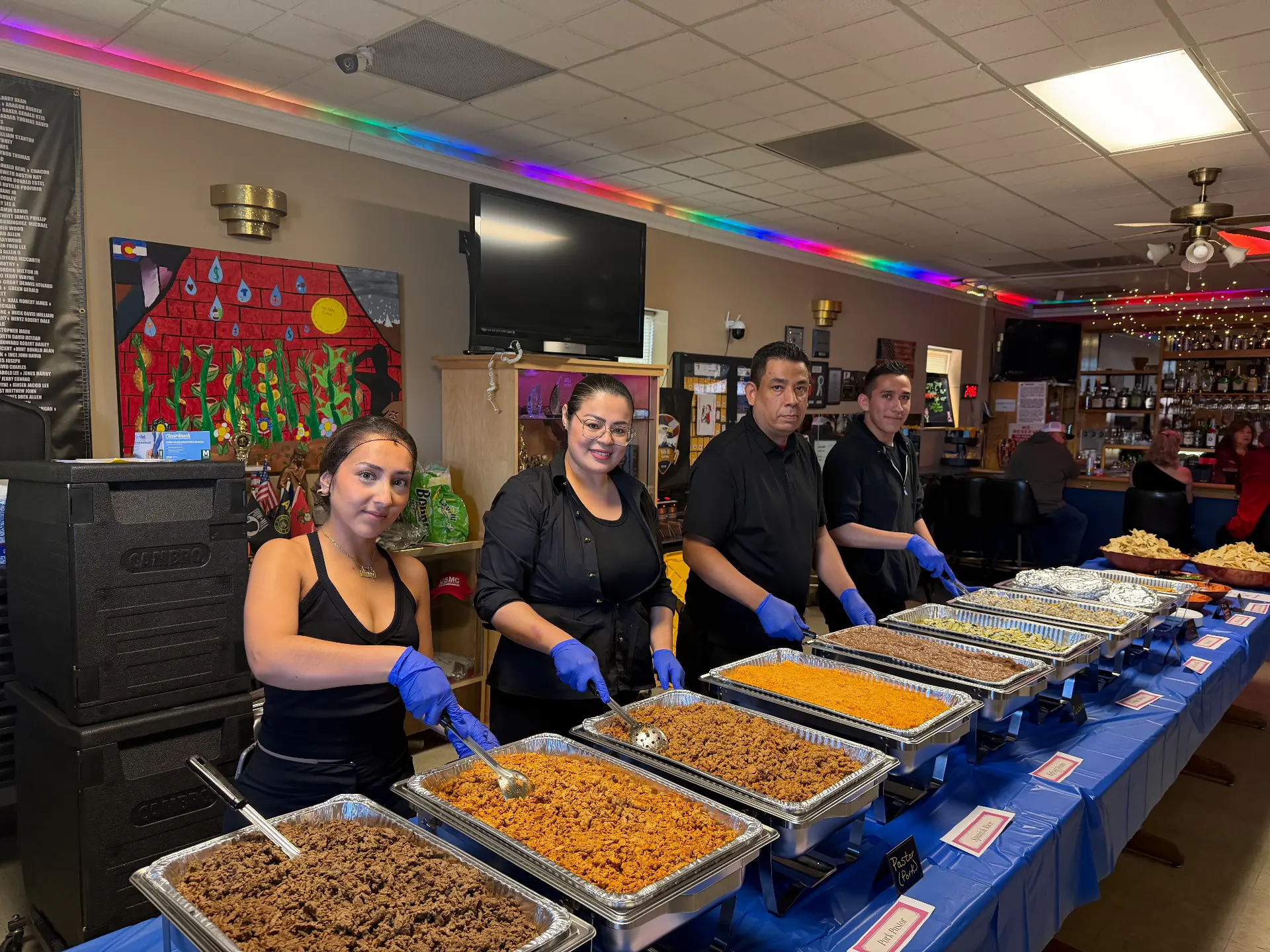 Combi Taco staff serving a large catered event
